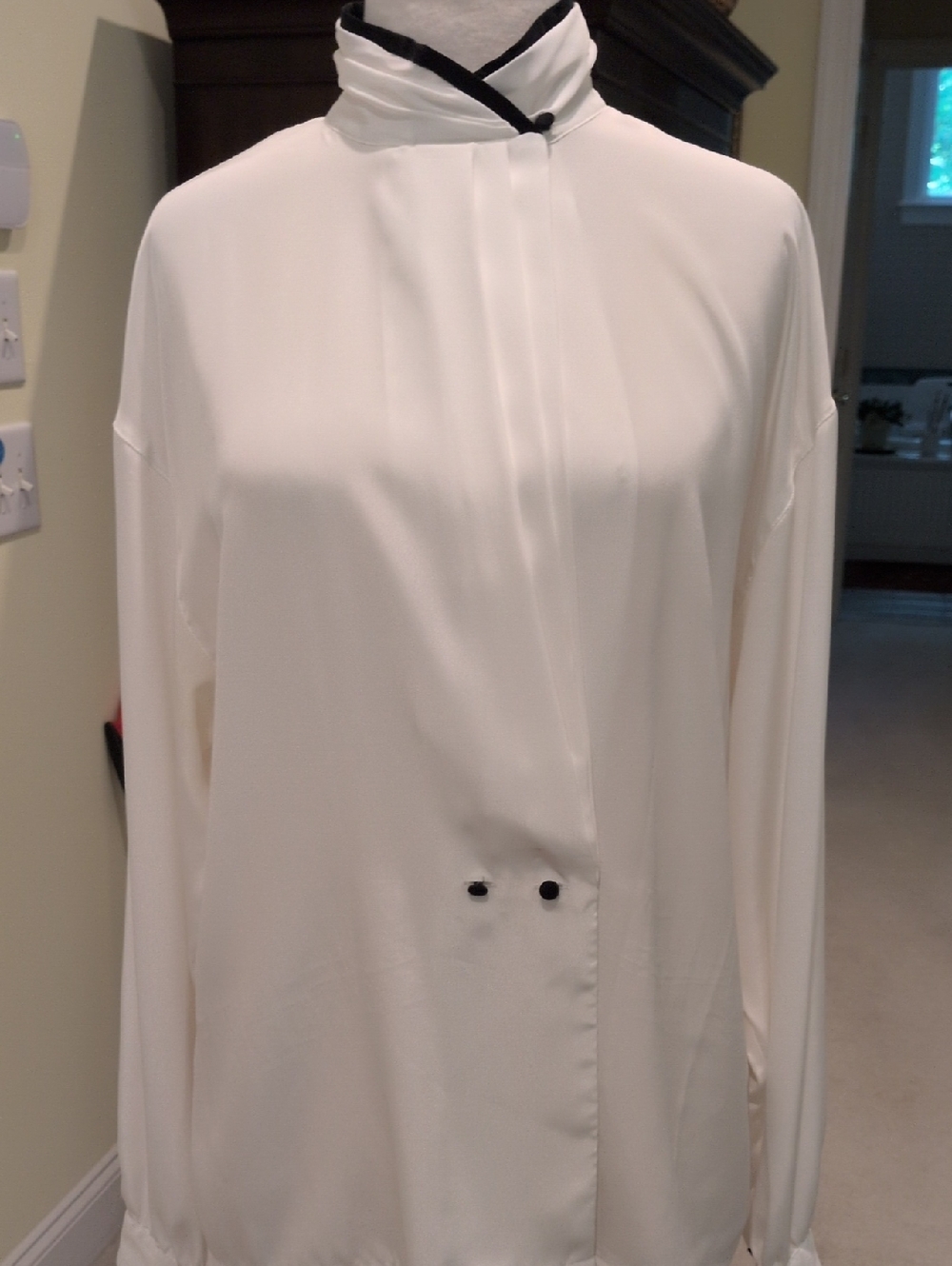 vintage alexandria long sleeve blouse, cream with with black piping and buttons.